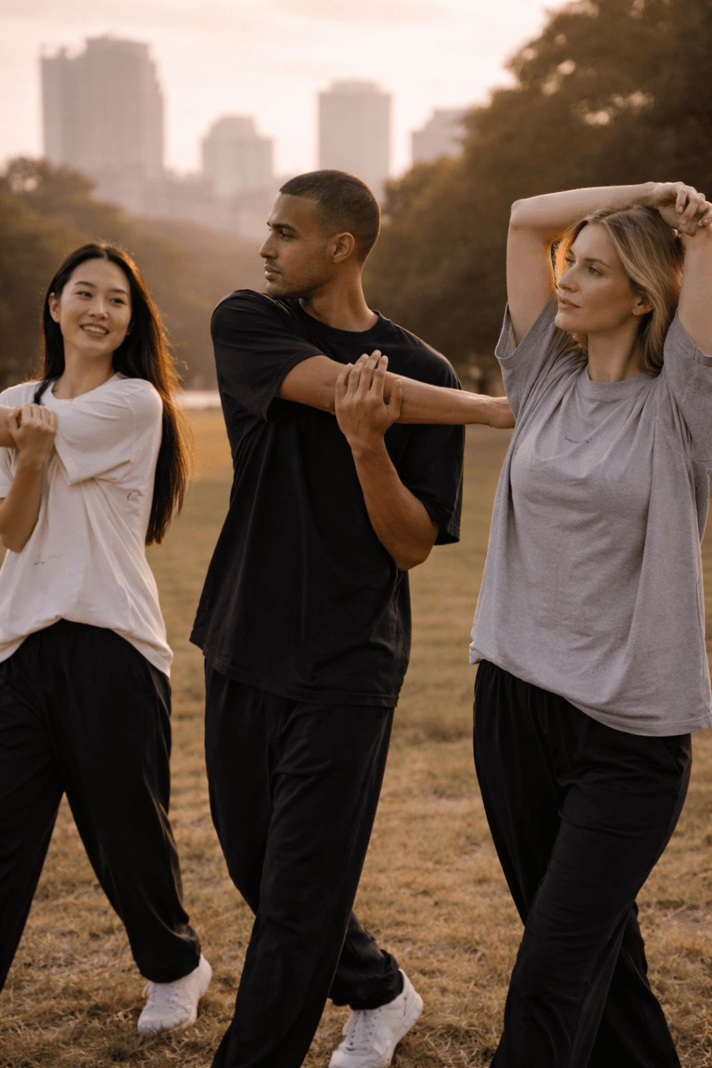 Friends warming up together in a park
